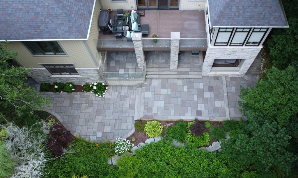 Full Outdoor Renovation with Natural Stone in Backyard Patio, Driveway and Front Entrance